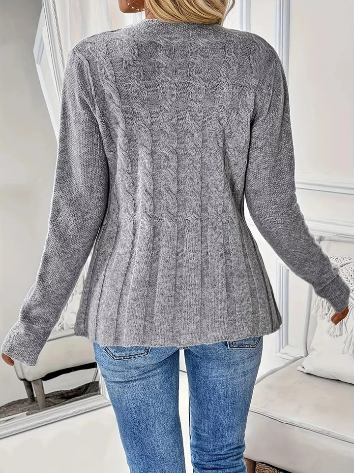 Cable knit button-up cardigan with peplum hem