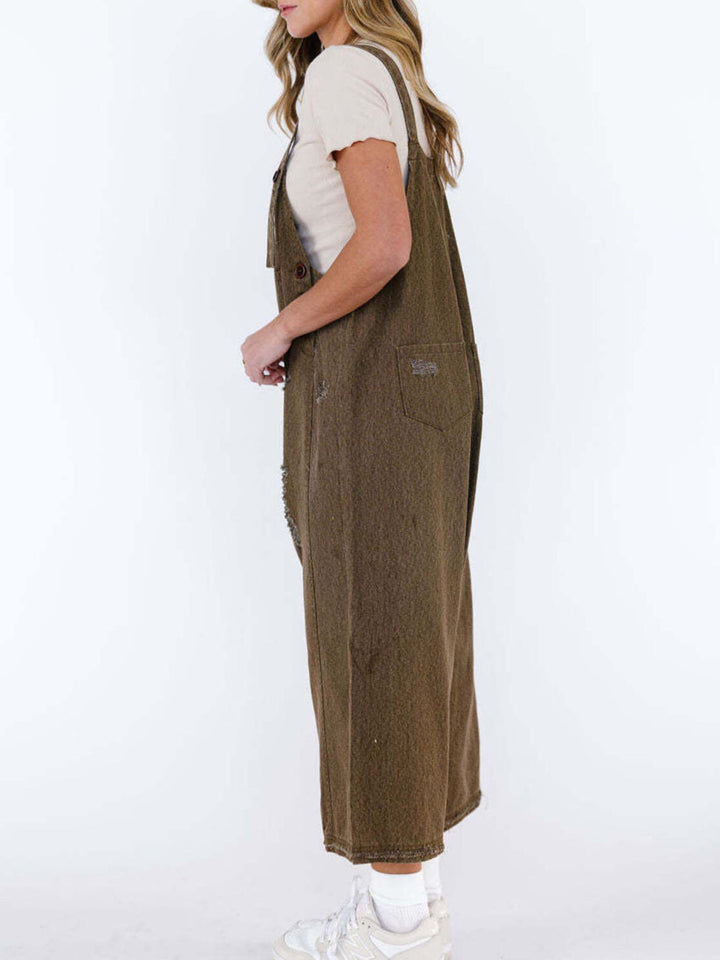 Distressed wide leg denim overalls with adjustable straps
