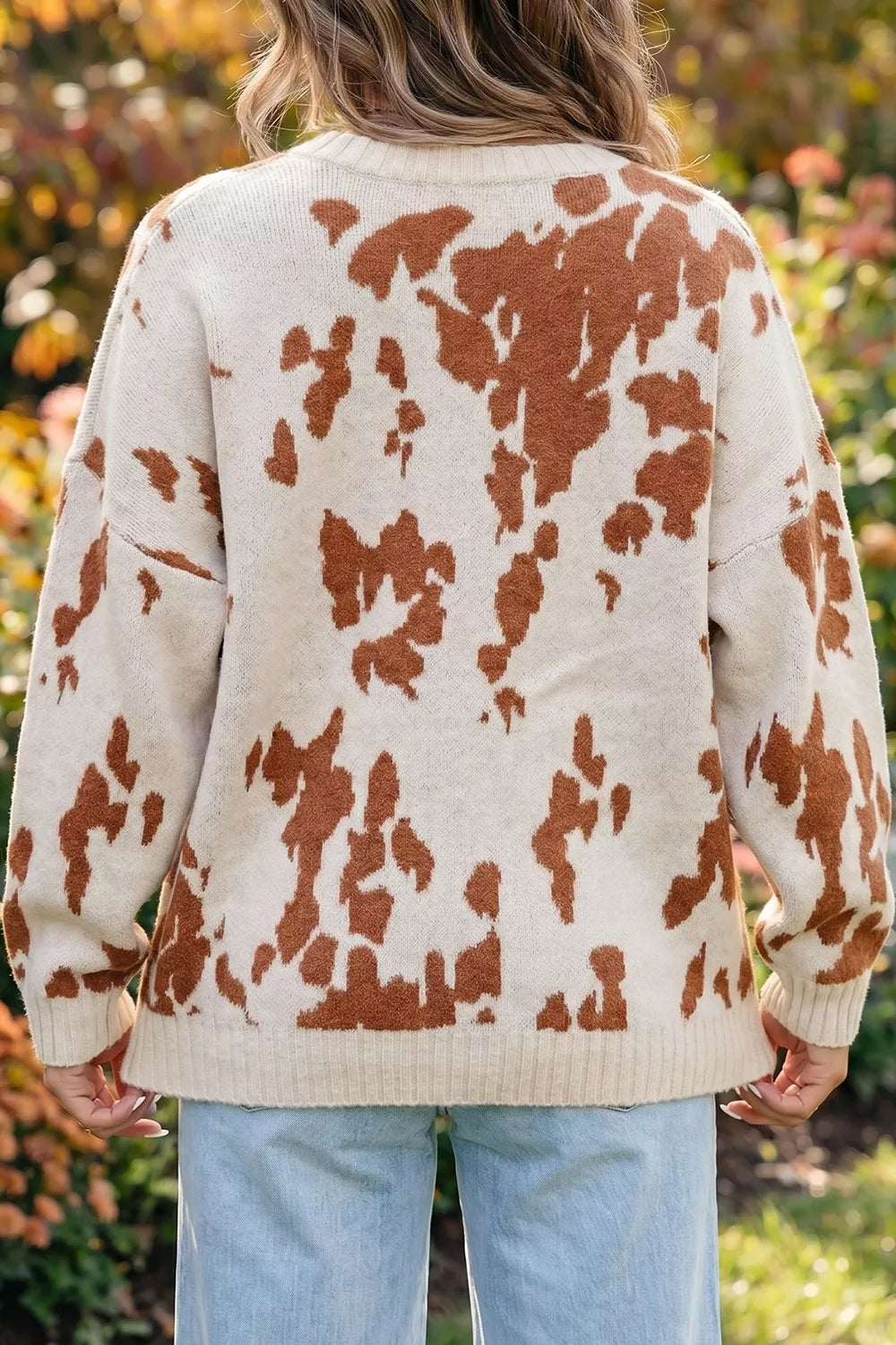 Cow print drop shoulder crewneck sweater