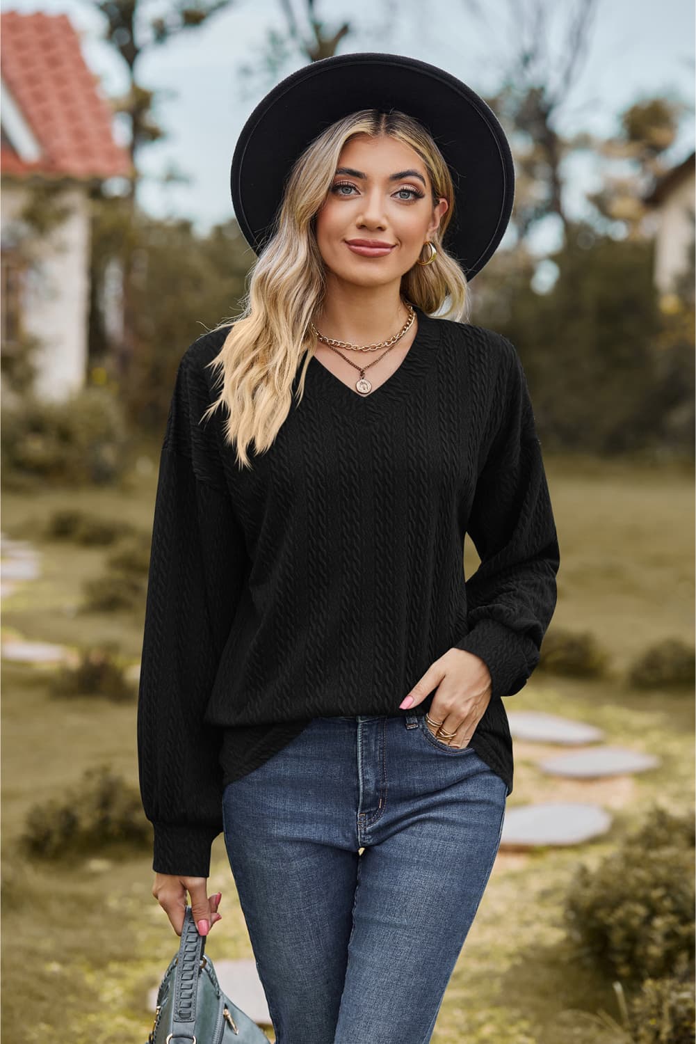 Black Textured knit V-neck top with dropped shoulders