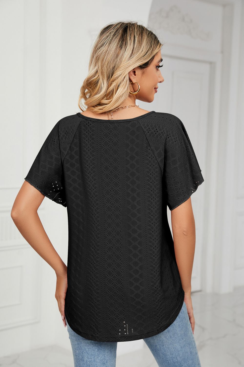 Eyelet flutter sleeve top with V-neck tie