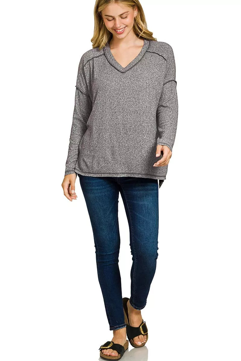 Exposed seam hacci knit V-neck top with hi-low hem