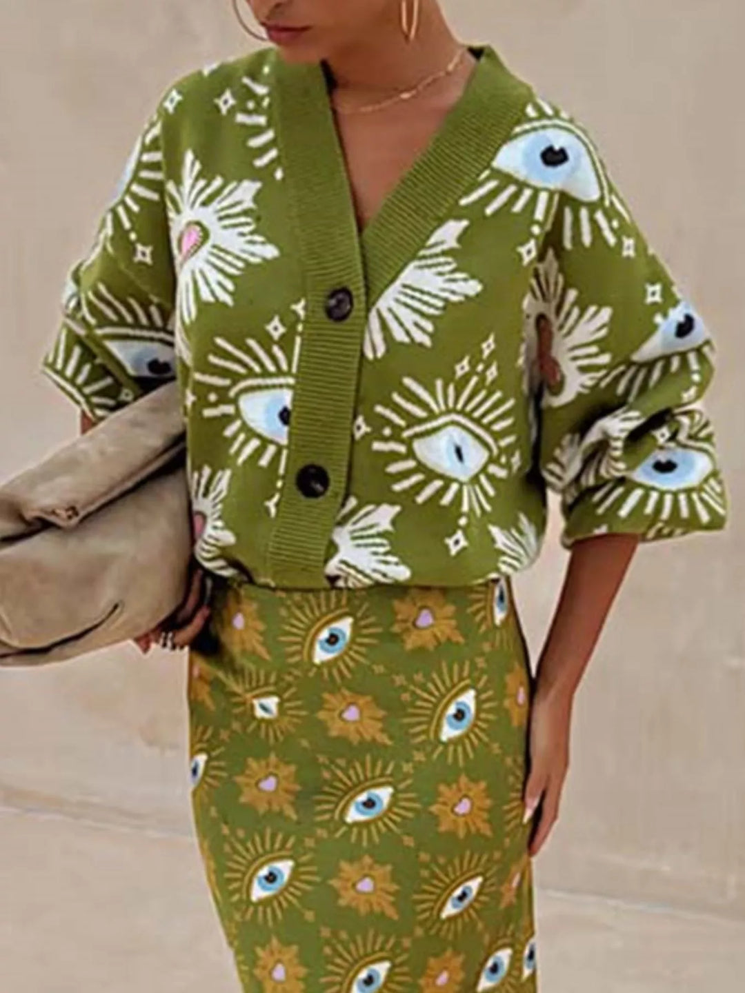 Evil eye print dropped shoulder button-down knit cardigan