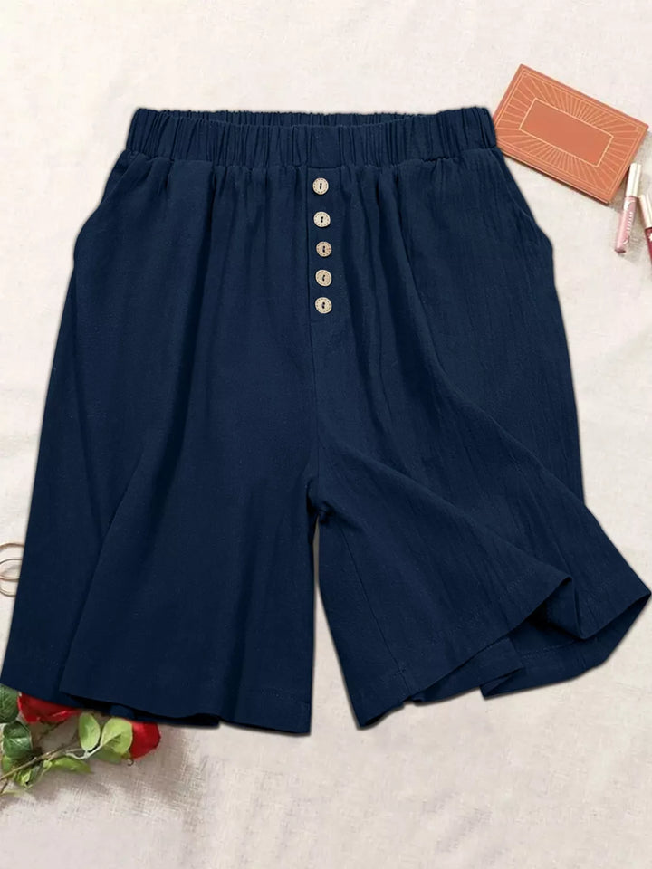 Plus-size elastic waist button-front shorts with pockets