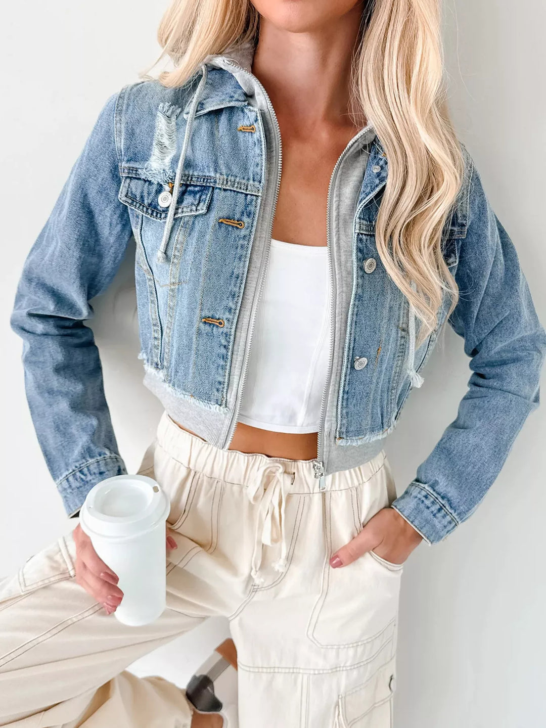 Distressed cropped hooded denim jacket with zip front