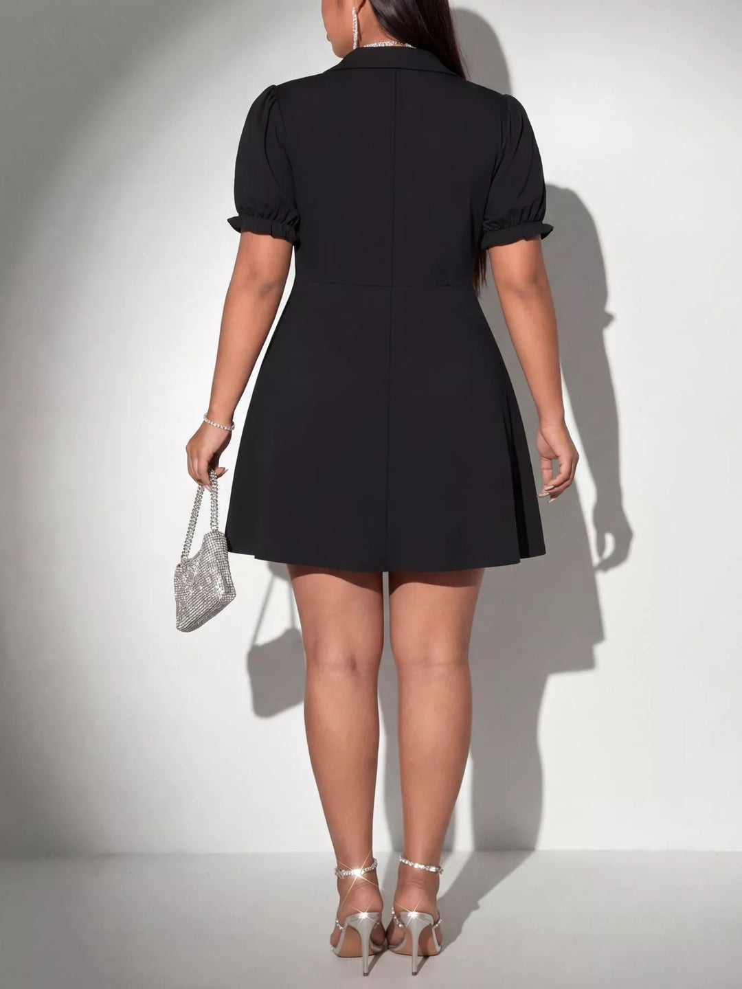 Ruched surplice plus size mini dress with puff sleeves