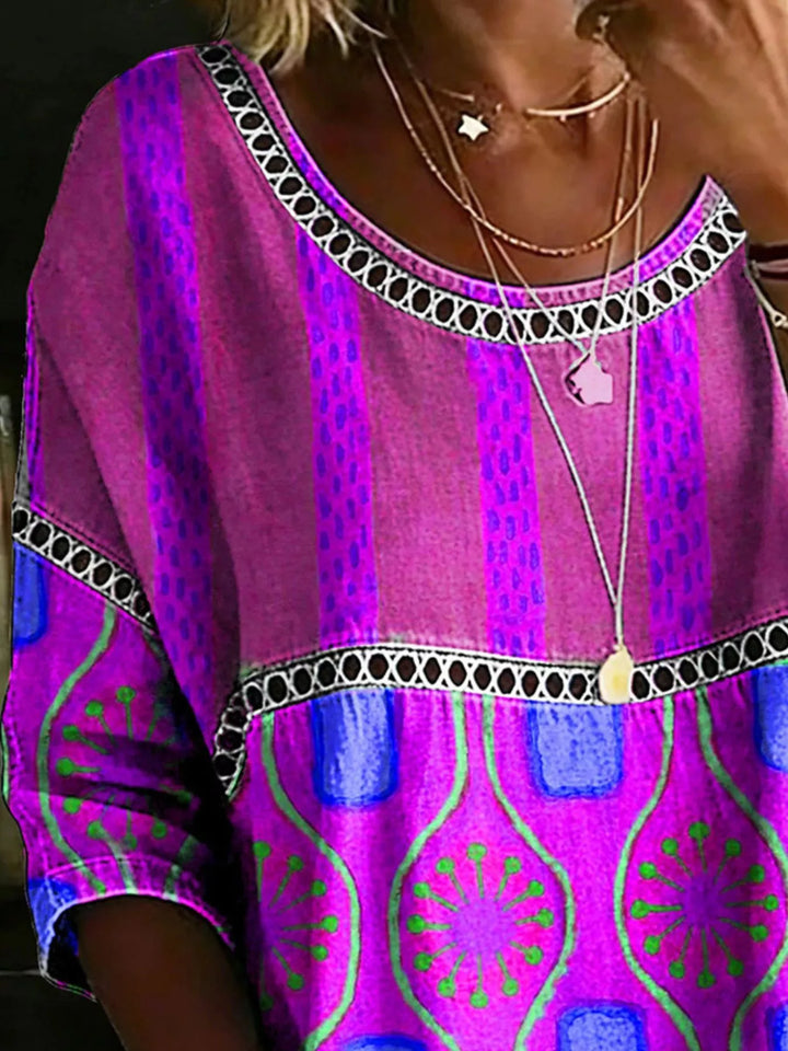 Floral print crochet-trim tunic top with 3/4 sleeves