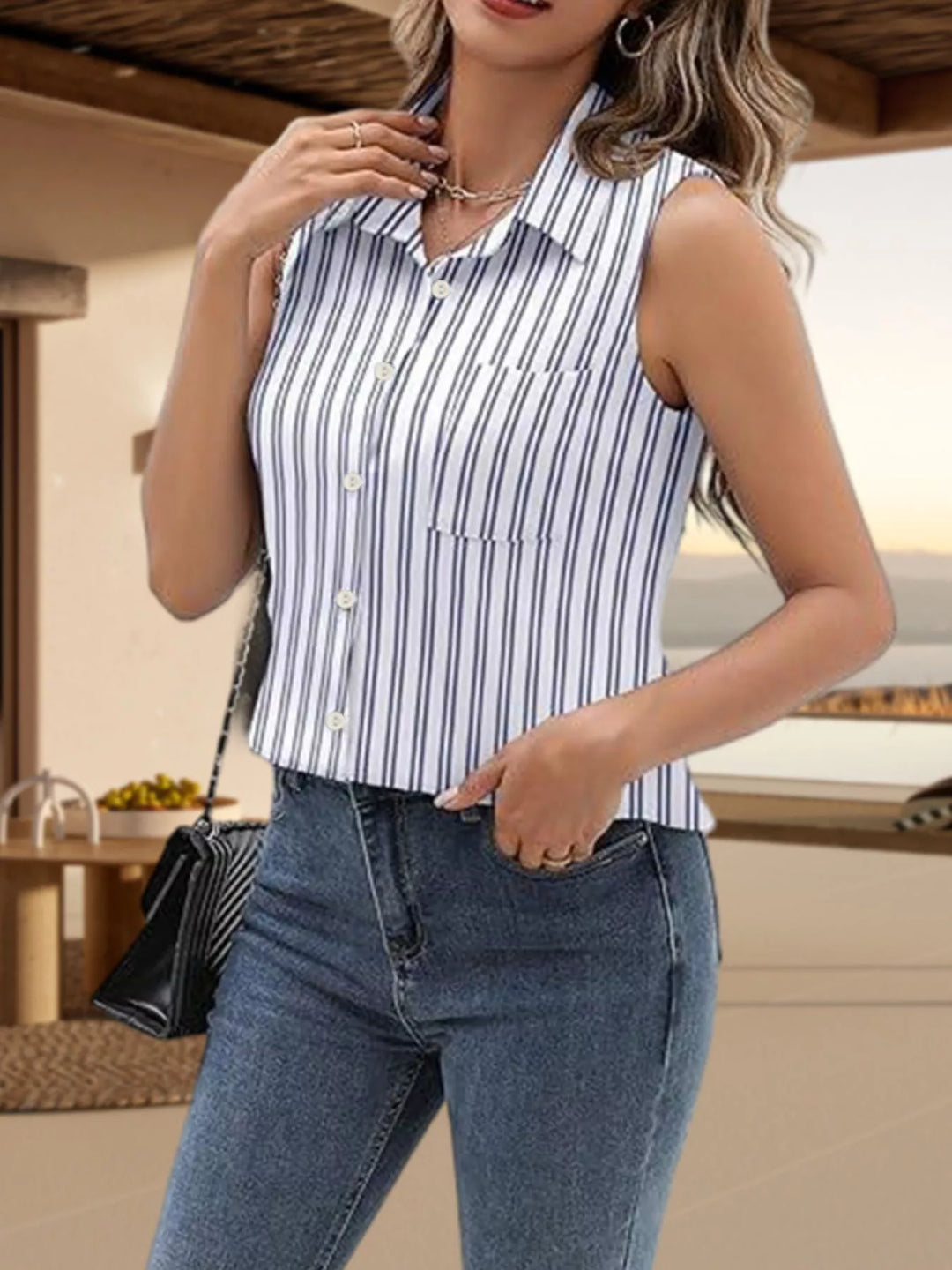 Sleeveless collared button-up shirt
