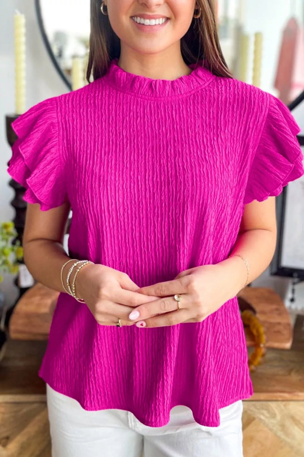 Crinkle-textured mock neck blouse with ruffle sleeves