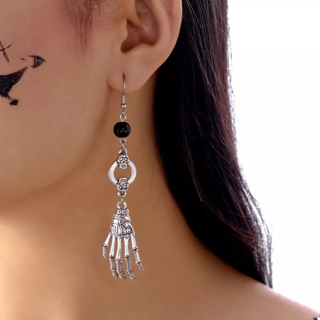 Skeleton hand drop earrings with skull charms