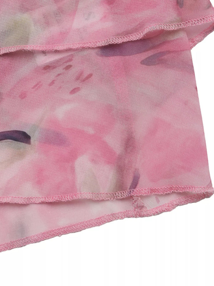 Floral halter cami with keyhole cutout and tiered ruffle hem
