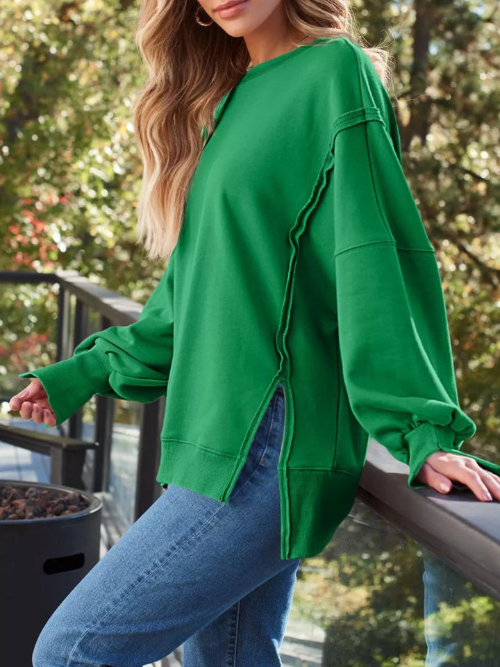 Oversized side-slit sweatshirt with exposed seams