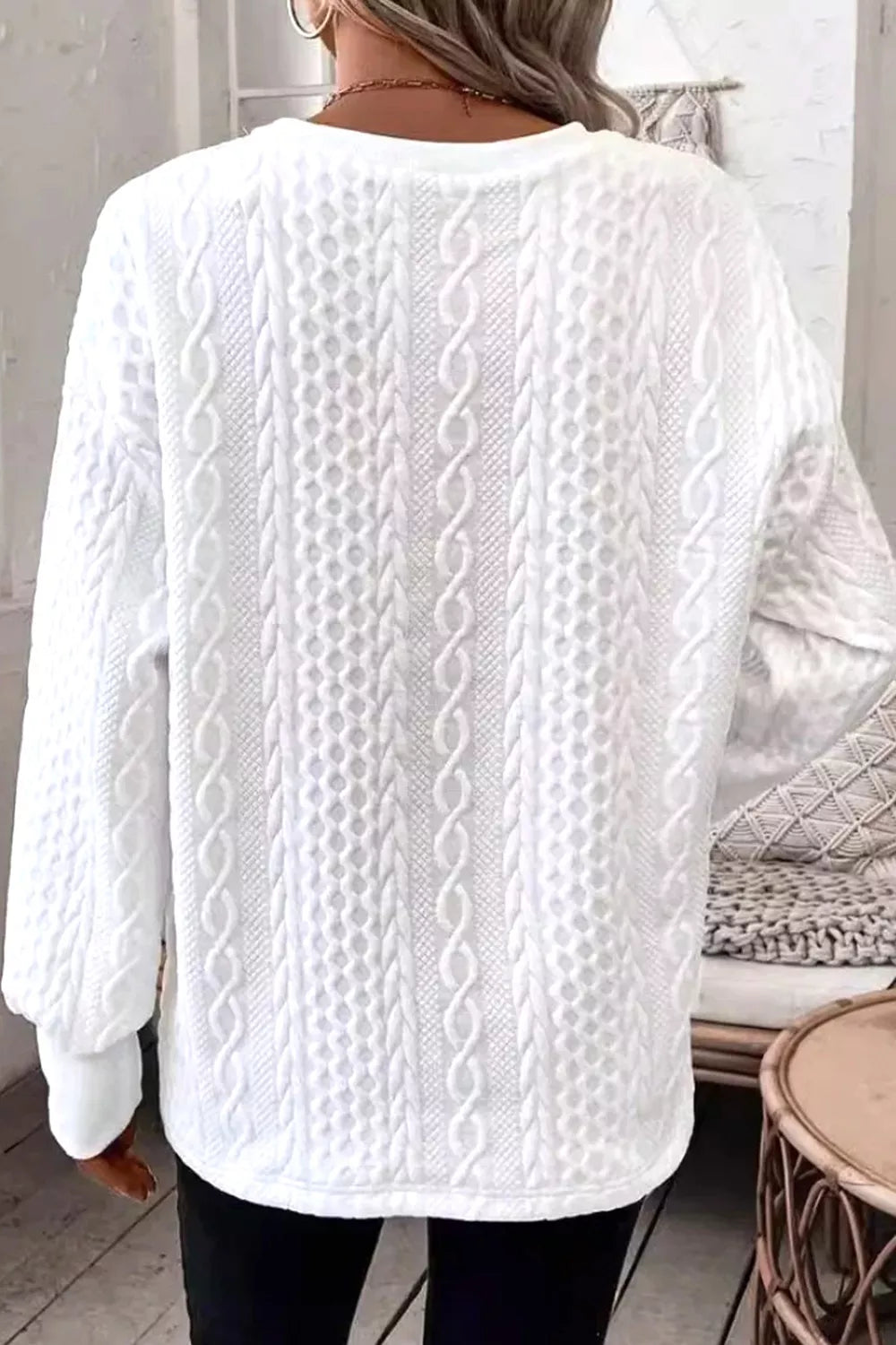 Cable-knit drop-shoulder V-neck pullover sweater