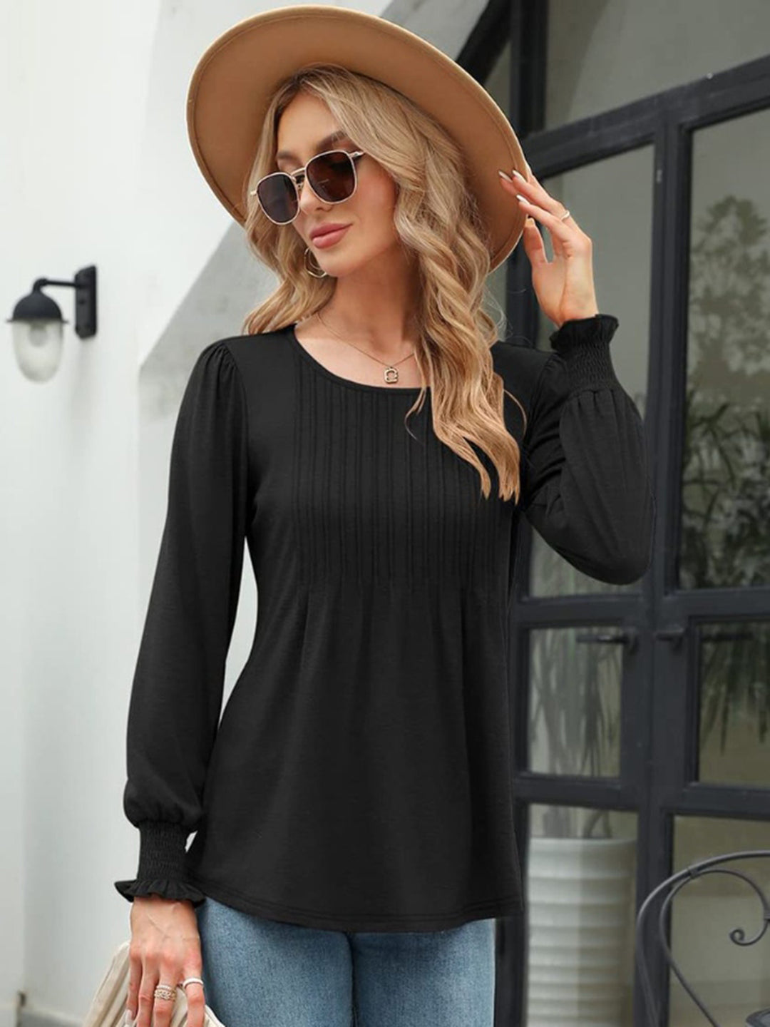 Pleated front lantern sleeve blouse with smocked cuffs