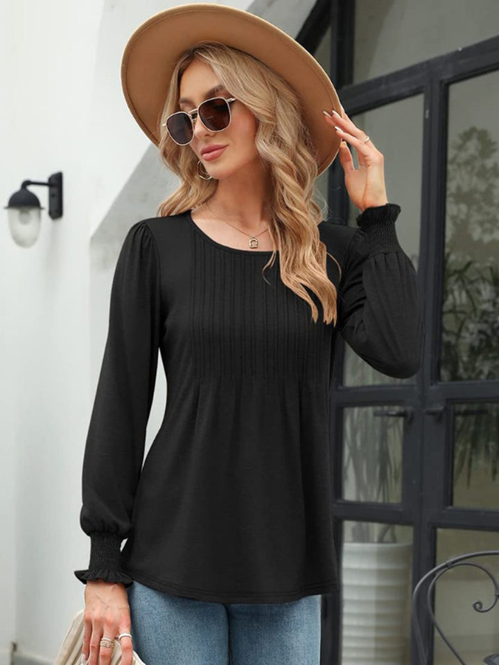Pleated front lantern sleeve blouse with smocked cuffs