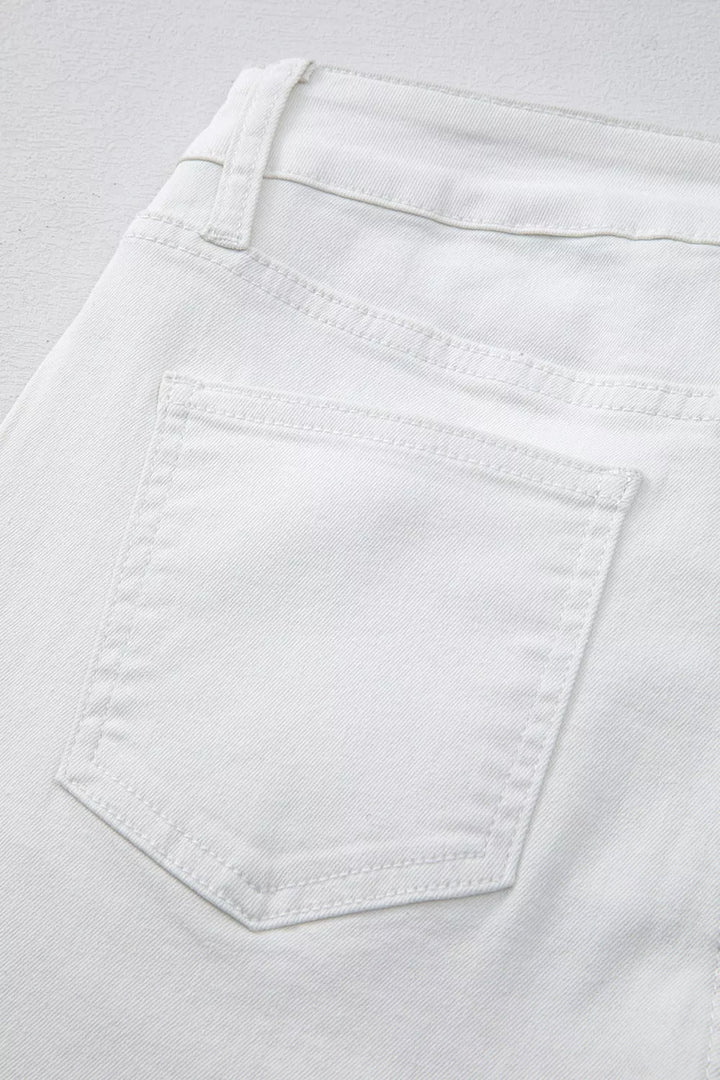High-rise straight leg jeans with released hem