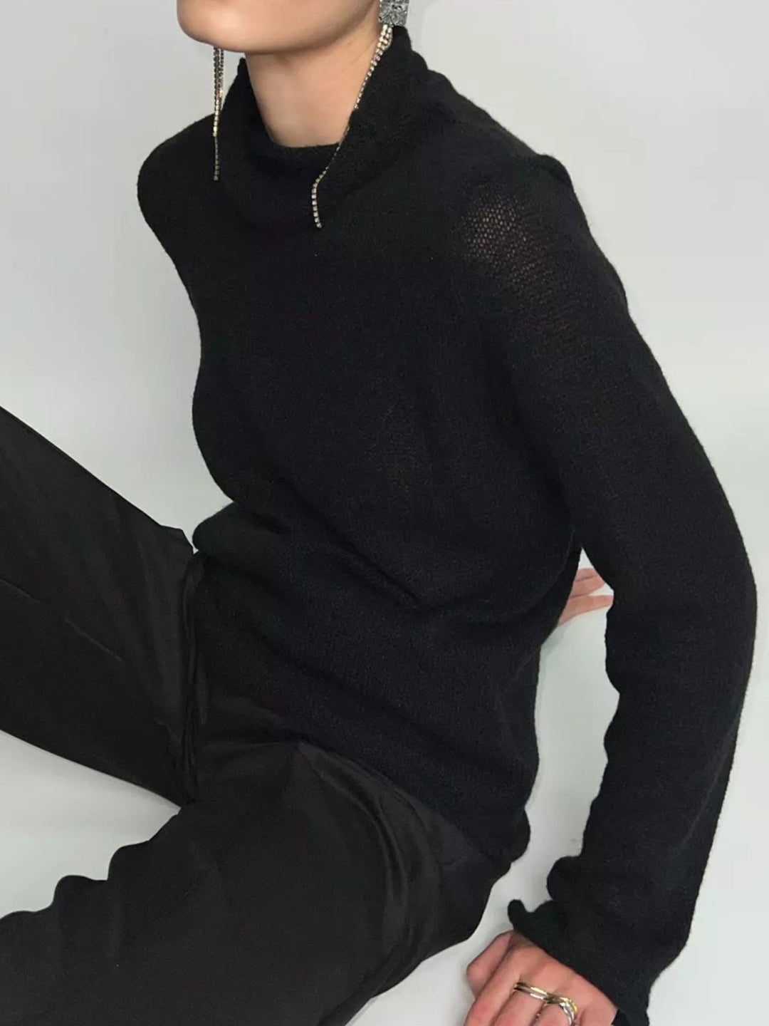 Sheer open-knit mock neck sweater with long sleeves