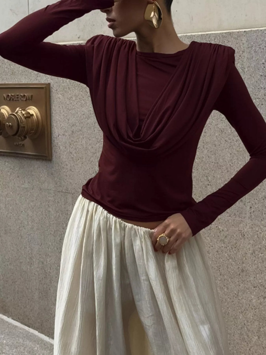 Draped cowl neck long sleeve top with ruched sides