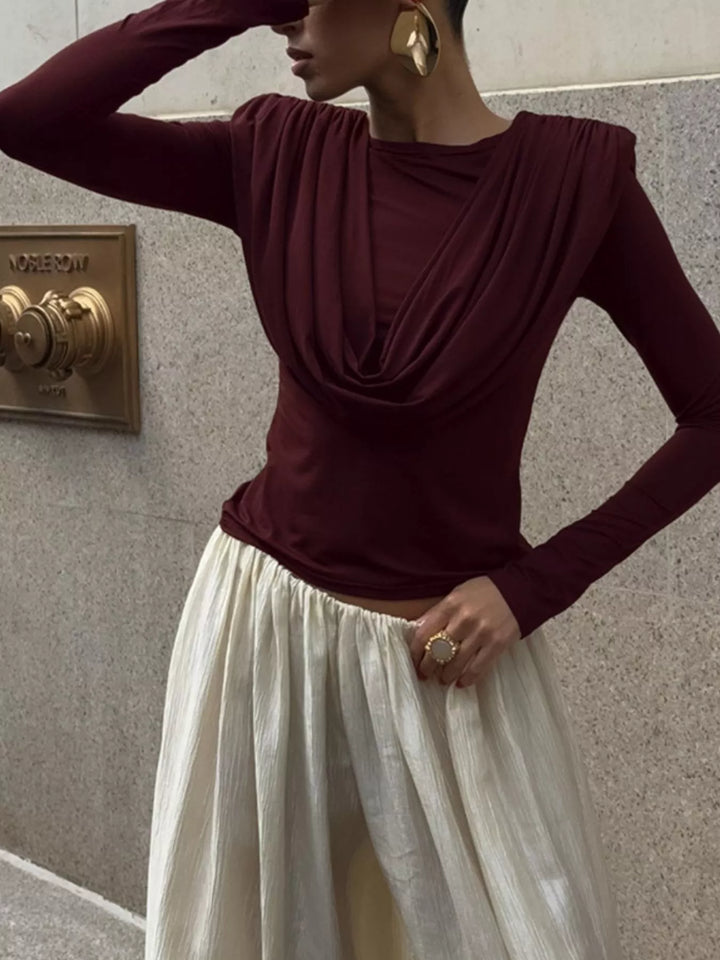 Draped cowl neck long sleeve top with ruched sides
