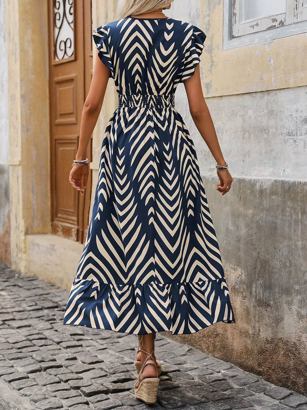 Geometric print midi dress with cap sleeves and smocked waist