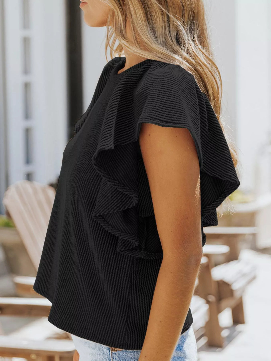Ribbed knit top with ruffled cap sleeves