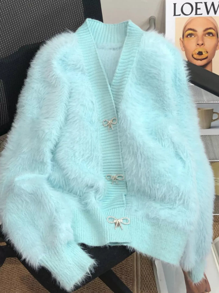 Blue Fuzzy knit cropped cardigan with rhinestone bow buttons