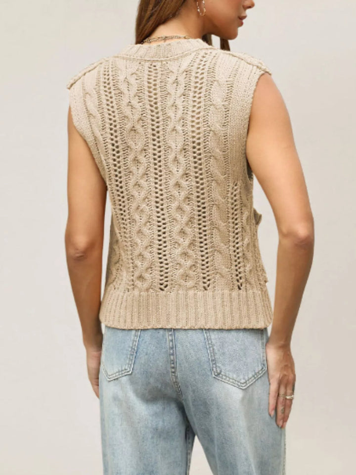 Cable knit button-down sweater vest with patch pockets