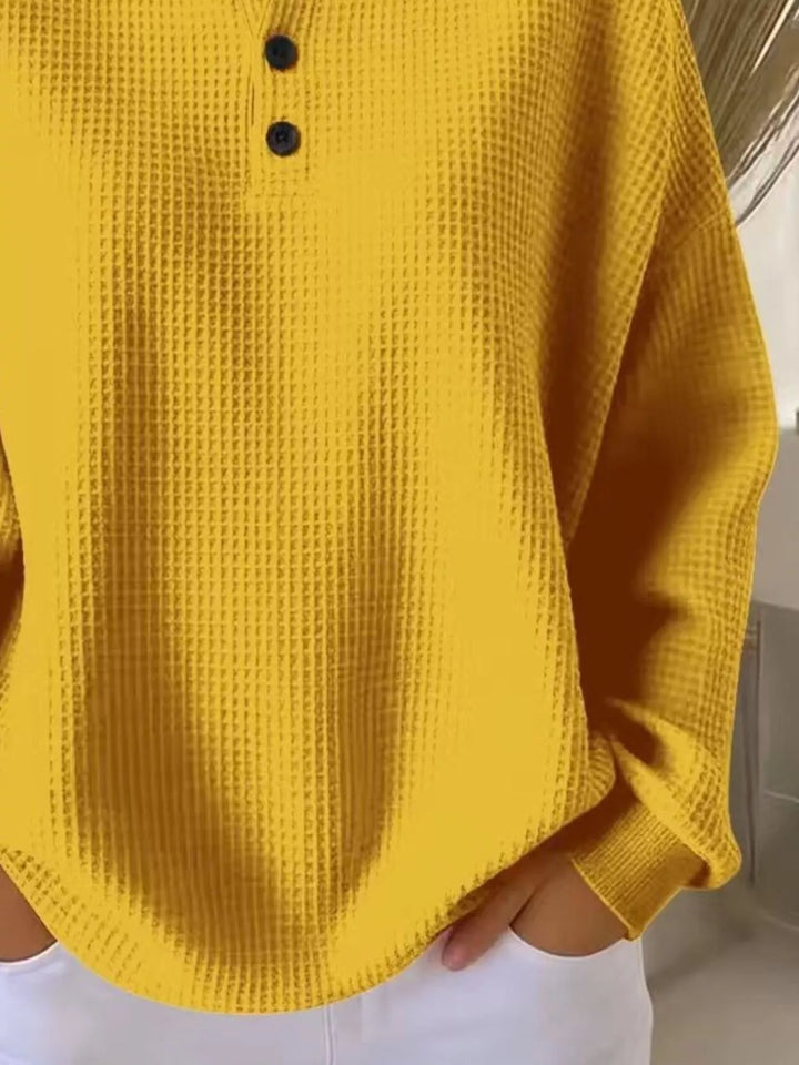 Waffle knit henley top with button placket and long sleeves