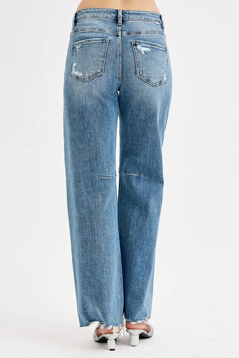 Distressed mid-rise wide-leg baggy jeans with raw hem