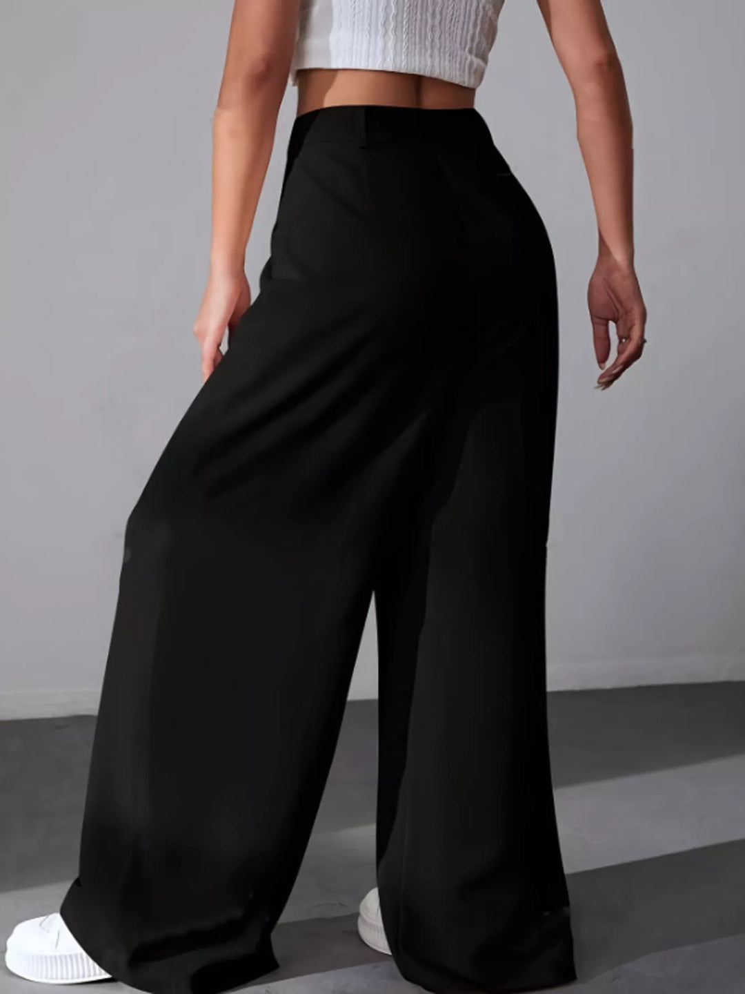 High-rise wide-leg pleated pants with button waist