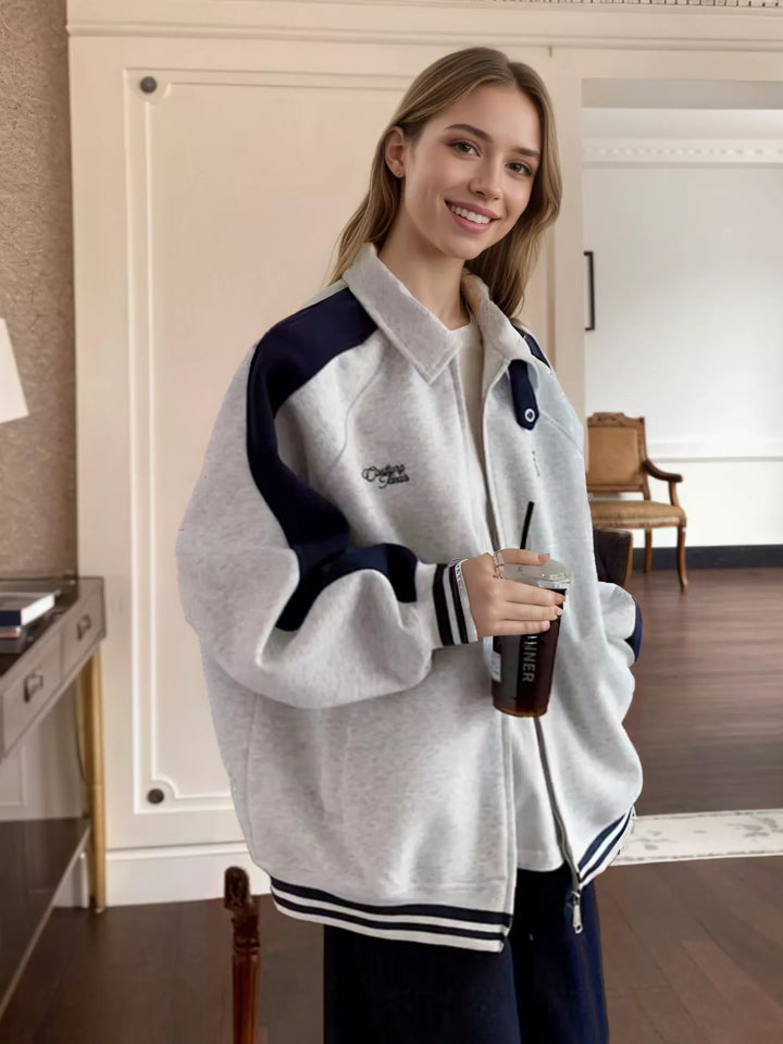 Color block zip-up track jacket with striped ribbed hem