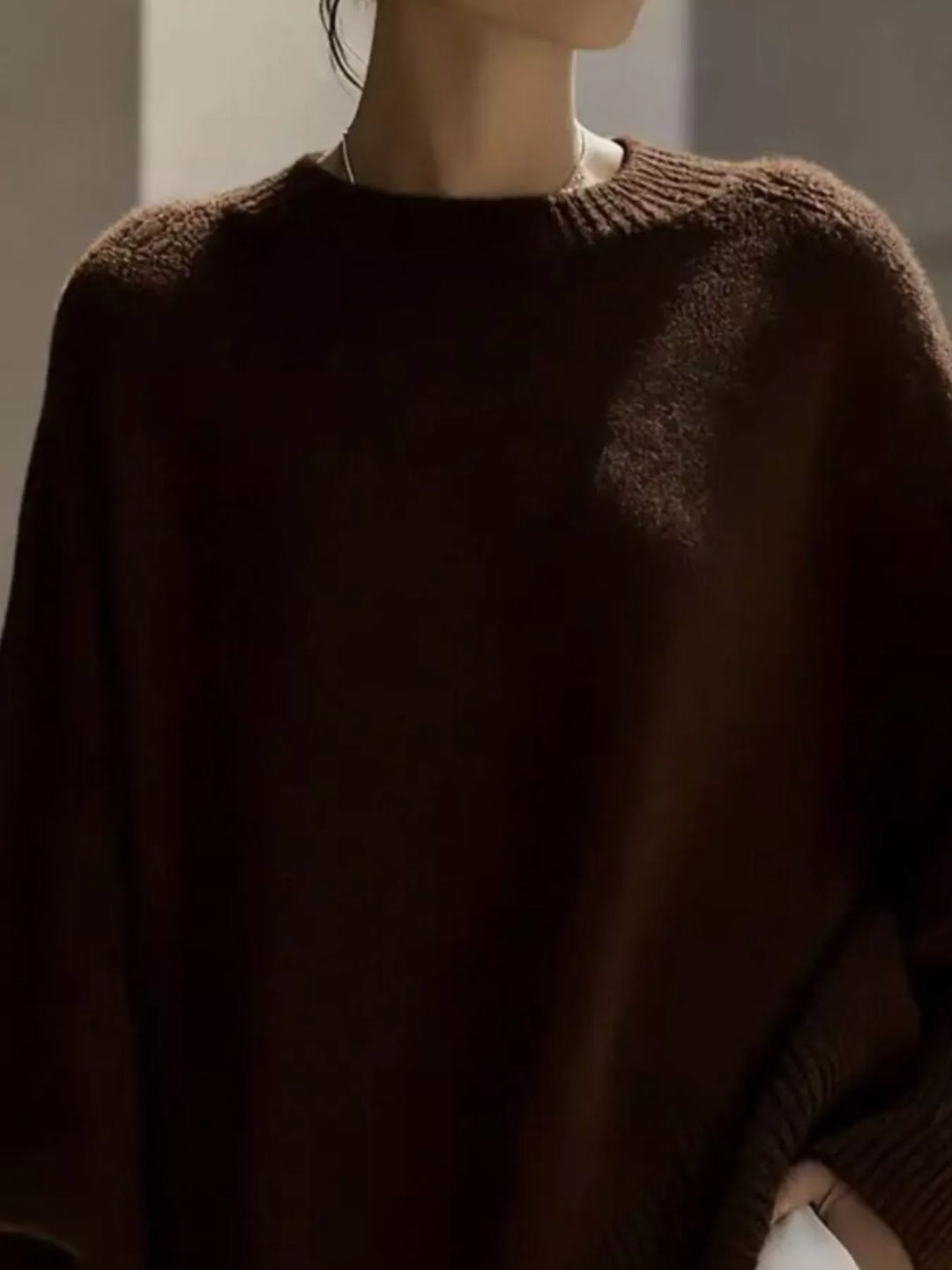 Batwing sleeve oversized sweater with asymmetric hem