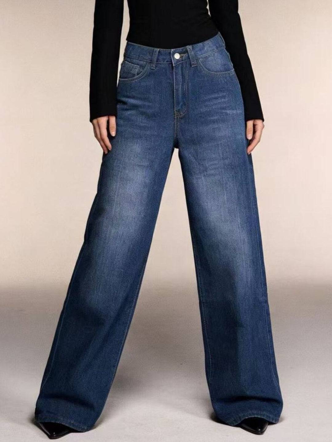 High-rise wide-leg jeans with whiskered fading