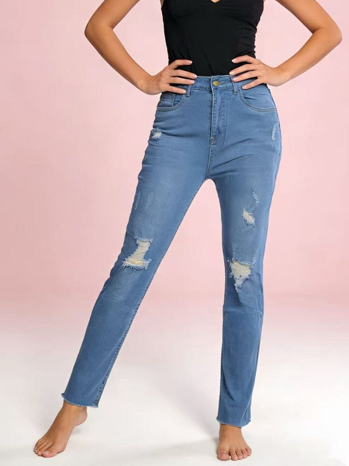 Distressed high-rise skinny jeans with frayed hem