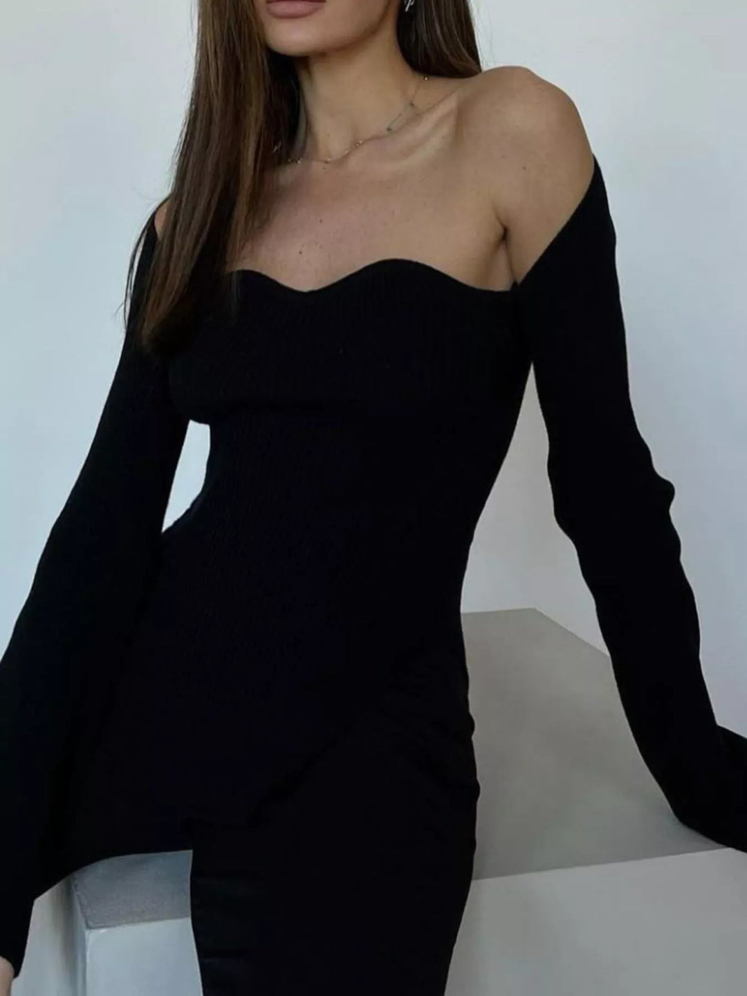 Ribbed knit sweetheart neckline sweater with slit hem