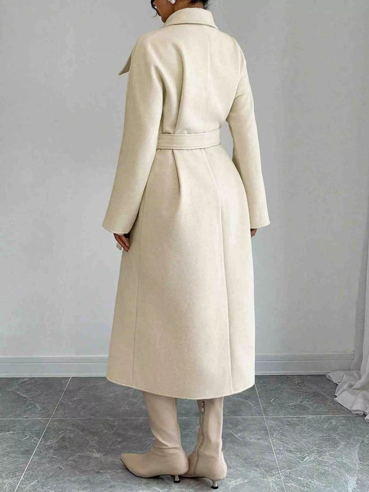 Double-breasted belted longline coat with stand collar