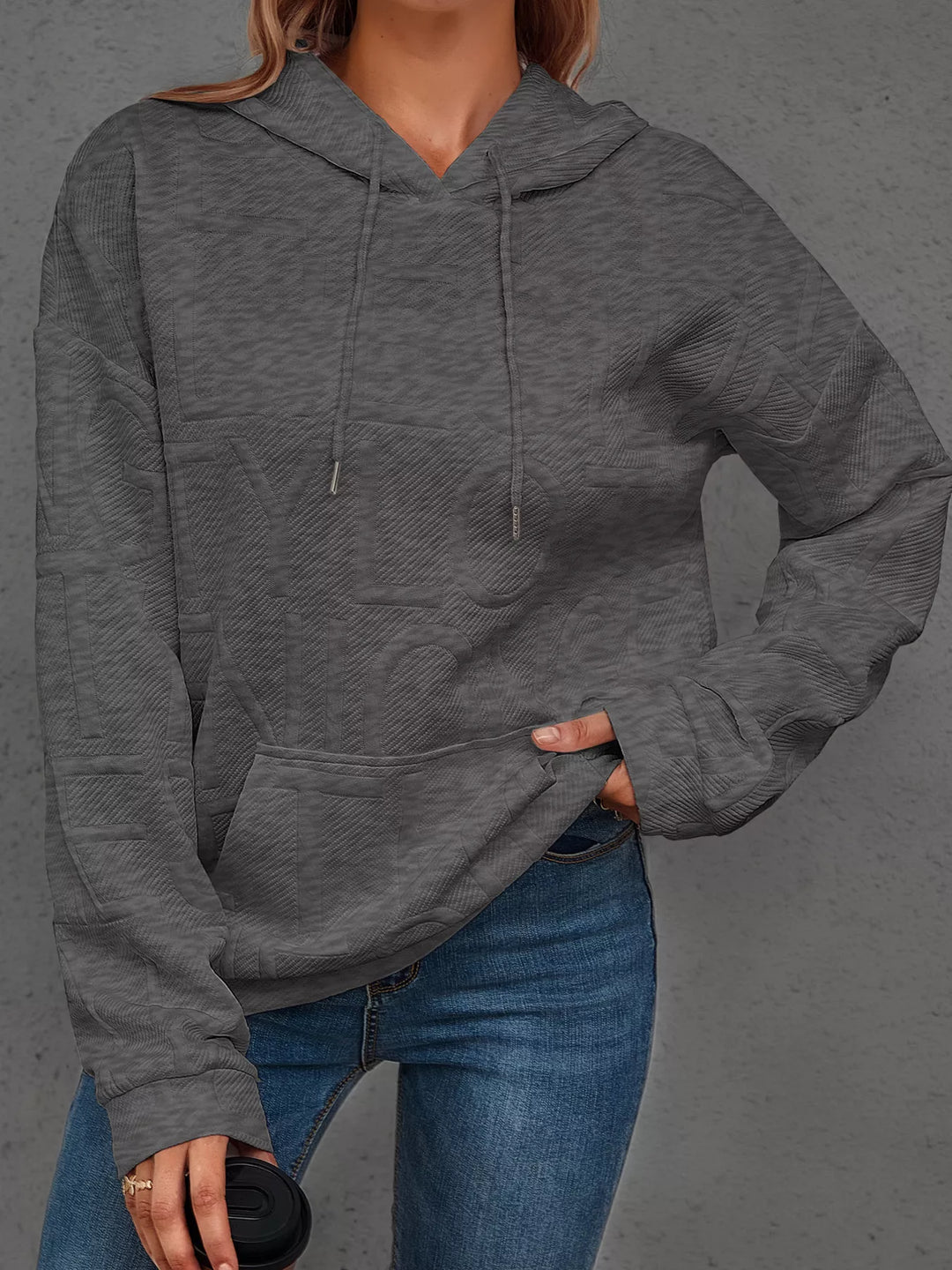Textured embossed letter pullover hoodie with front pocket