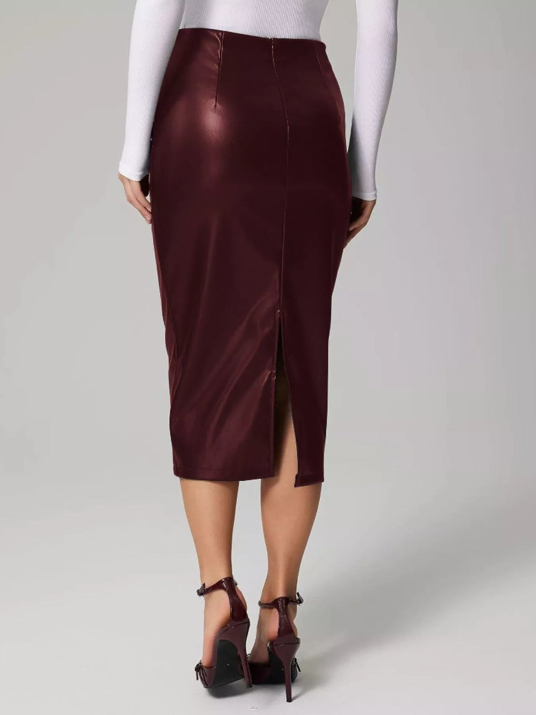 High-rise faux leather midi pencil skirt with back slit