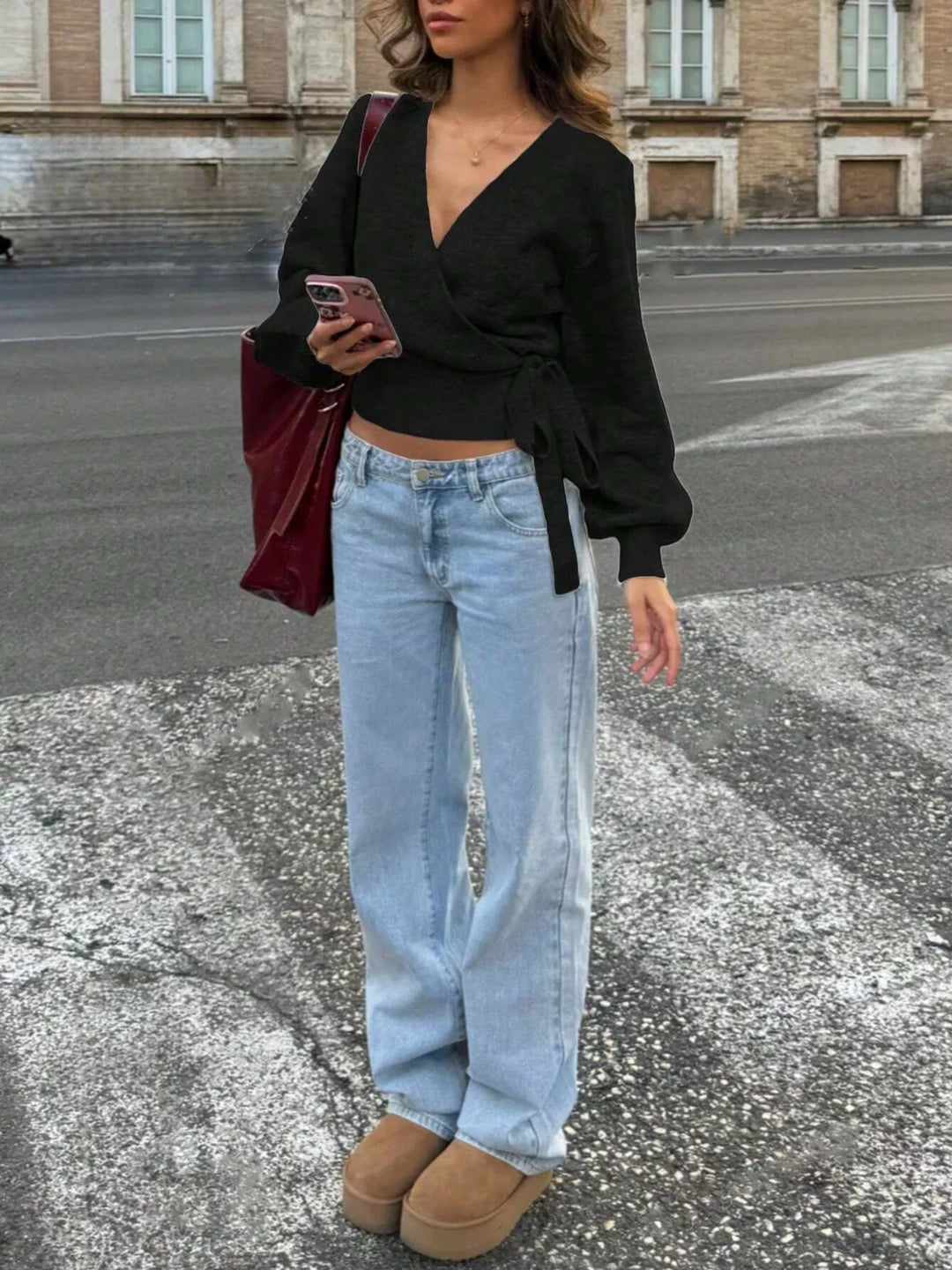 Tie-waist surplice wrap sweater with balloon sleeves