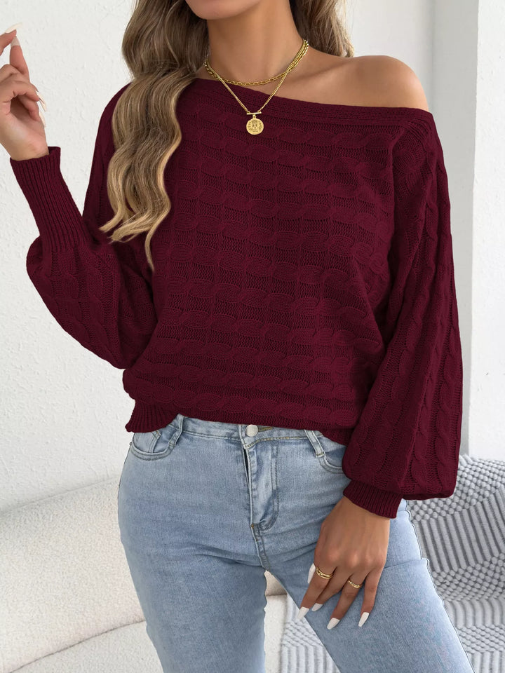 Cable knit boat neck sweater with dolman sleeves