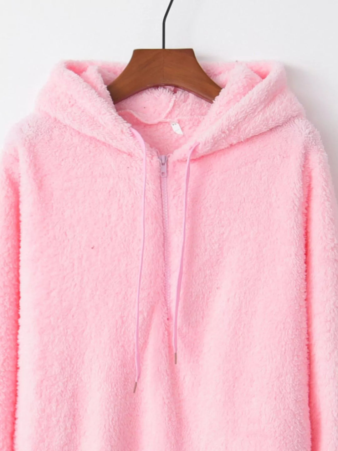 Plush half-zip fleece hoodie with drawstring hood and pockets