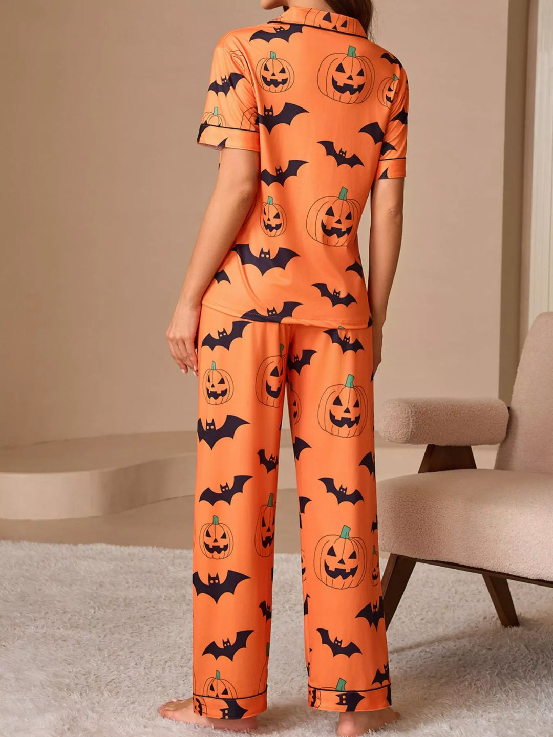 Pumpkin and bat print short sleeve pajama set with piped trim