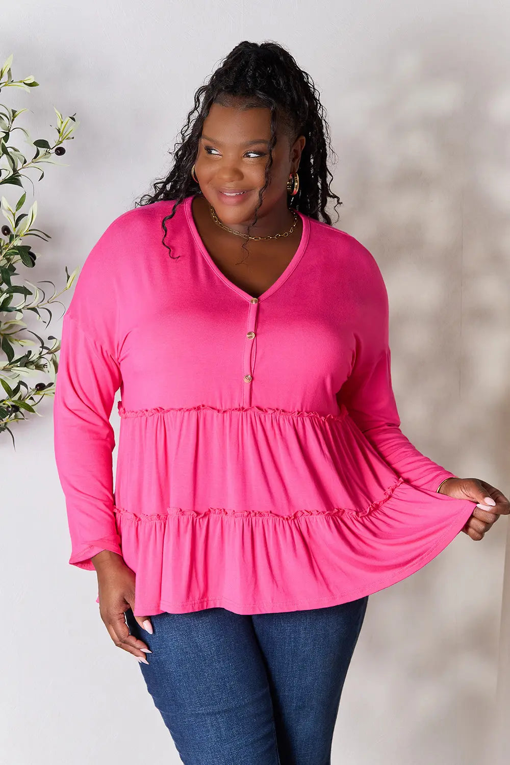 Hot Pink Half-button long sleeve blouse with tiered ruffle hem