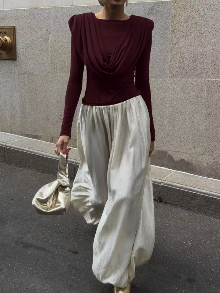 Draped cowl neck long sleeve top with ruched sides