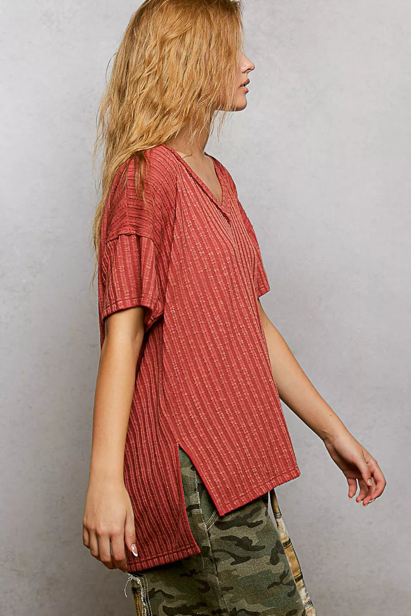 Ribbed knit V-neck tee with exposed seam and side slits