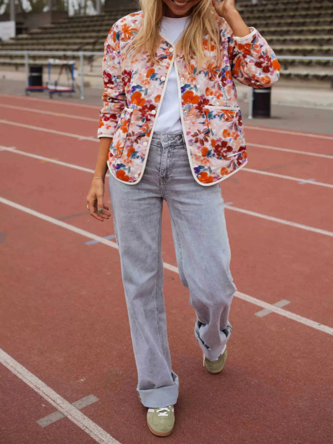 Floral print quilted jacket with contrast piping and patch pockets