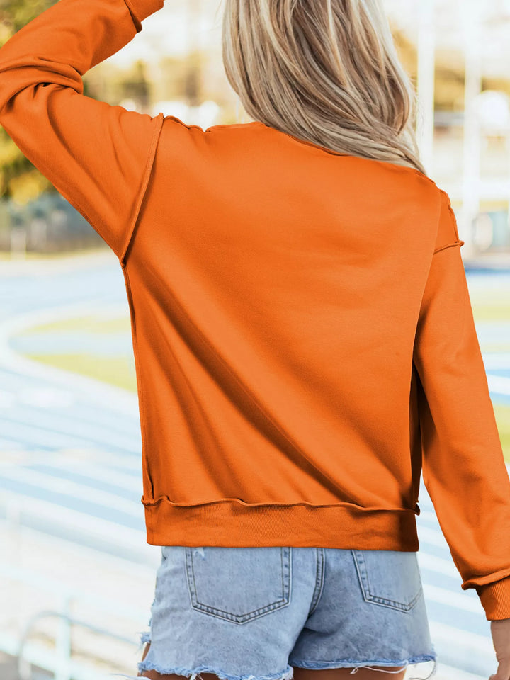 Polka dot jack-o-lantern face graphic pullover sweatshirt