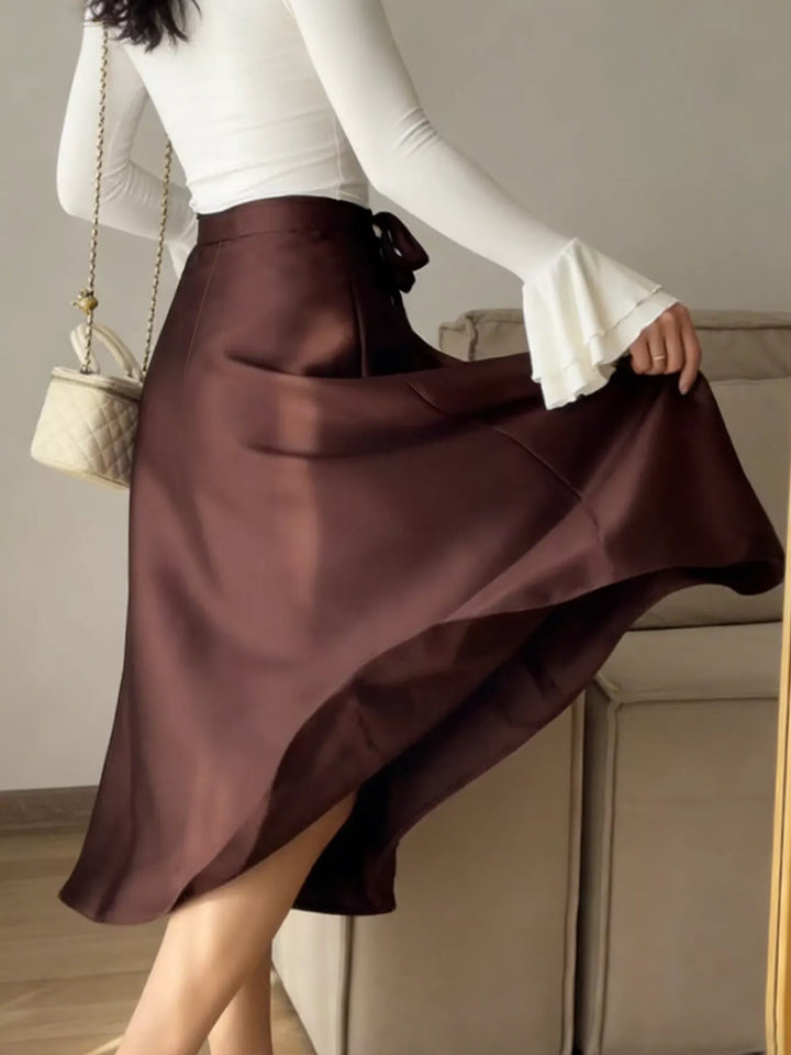 High-waist satin A-line midi skirt with tie bow