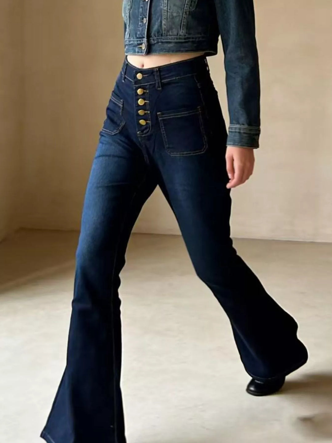 High-waisted button-fly flare jeans with patch pockets
