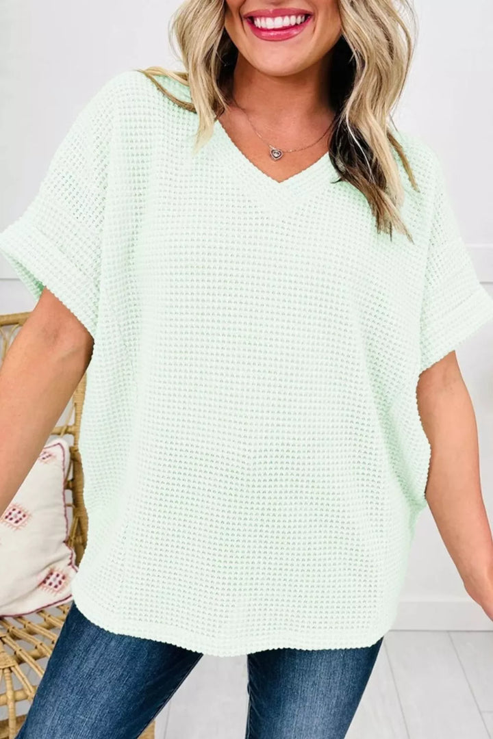 Plus size waffle knit V-neck top with cuffed short sleeves